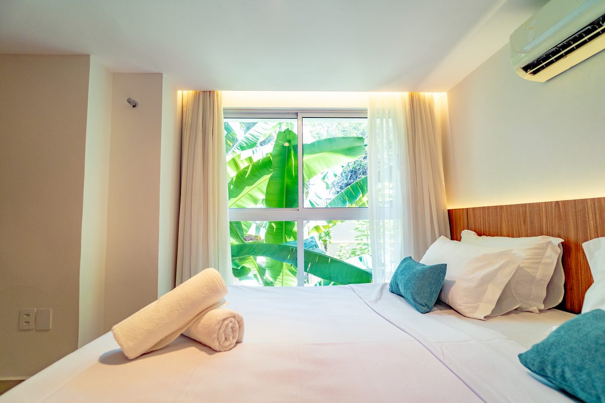 Quarto Jardim - cama com vista verde